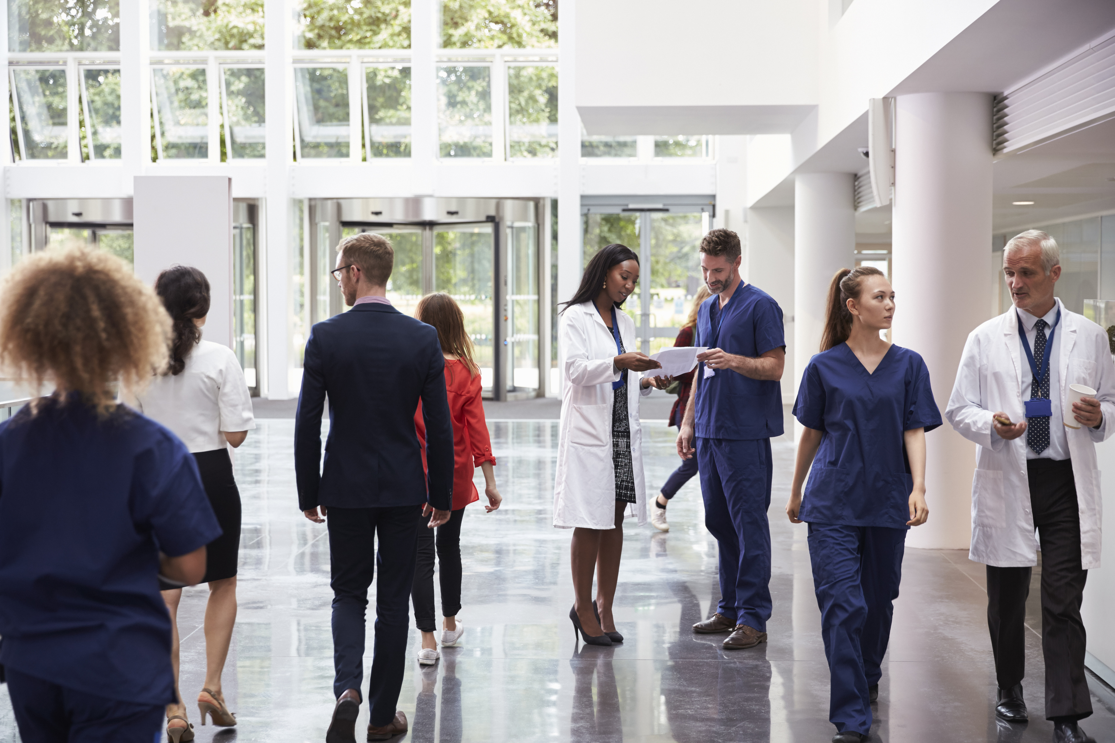 iStock-600073852_Staff In Busy Lobby Area Of Modern Hospital.jpg