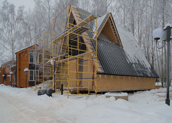 Snowy house under construction.jpeg