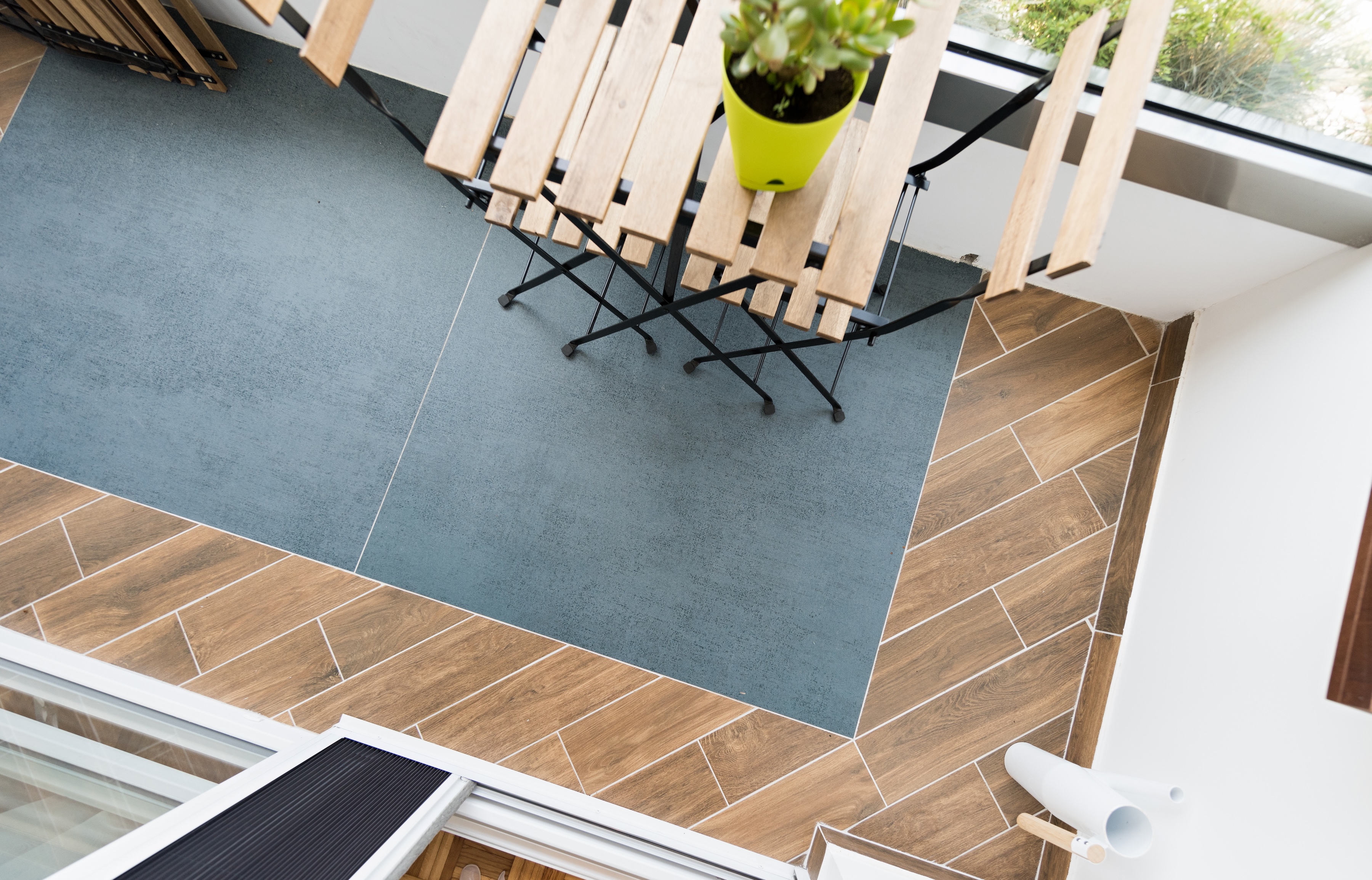 Multi tiles on terrace with contrasting white grout.jpeg